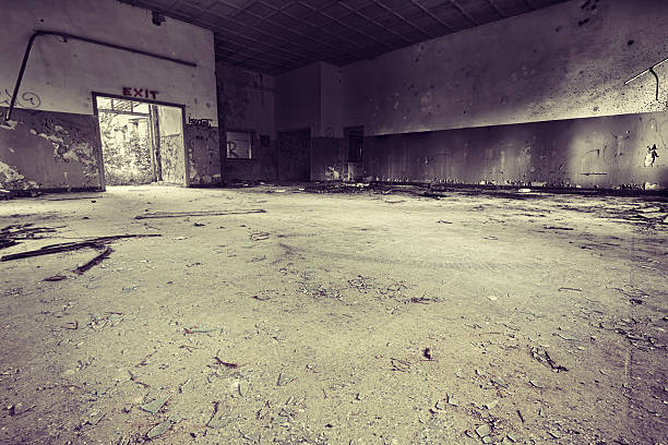 istock Dirty room in abandoned old ruined building 184141359