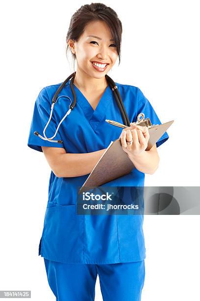 Cheerful Young Asian Nurse In Blue Scrubs Stock Photo - Download Image Now - Nurse, Cut Out, Filipino Ethnicity