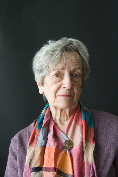 istock Elderly Woman Listening Sympathetically 184142001
