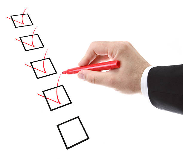 istock businessman filling a checklist 184142173