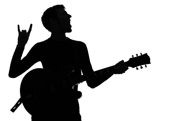 istock a silhouette of a guitarist on a white background 184142270