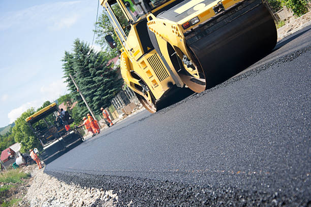 istock Ground view of machines paving asphalt 184142728