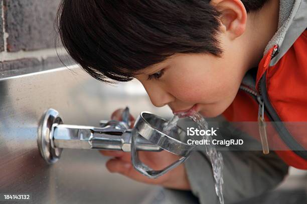 Drinking Fountain Stock Photo - Download Image Now - Child, Drinking Fountain, Boys