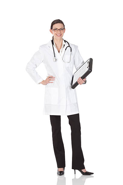 istock Female doctor standing with a clipboard 184144204