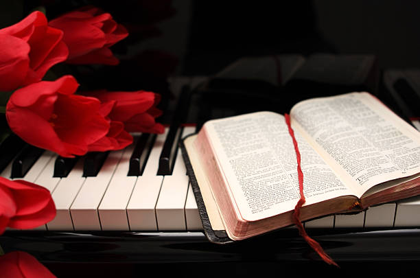 Bible and Piano stock photo