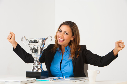 Businesswoman with trophy.View more: