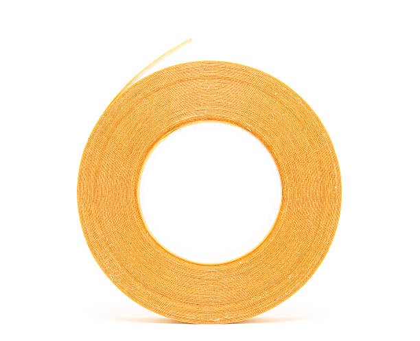 istock Roll of double sided adhesive tape on white background 184146269