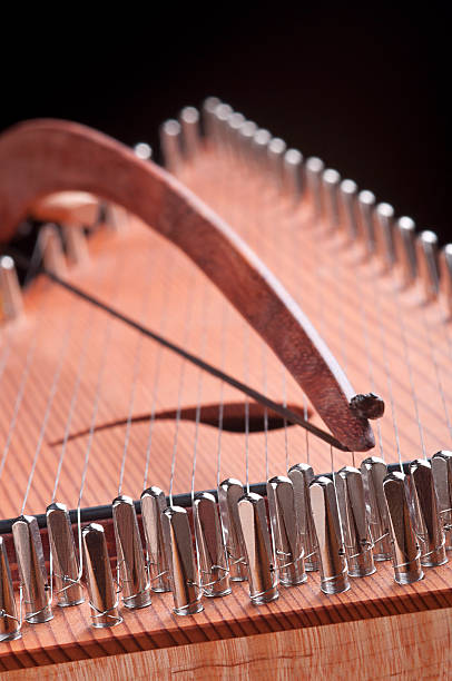 Bowed Psaltery Selective-focus image of a bowed psaltery (zither). psaltery stock pictures, royalty-free photos & images