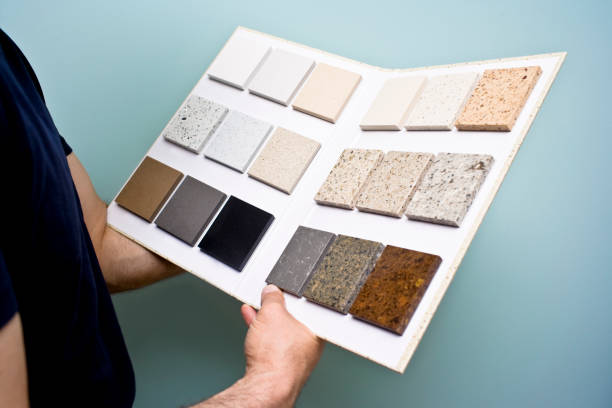 Counter Top samples Man looks at a selection of different counter top samples carpet sample stock pictures, royalty-free photos & images