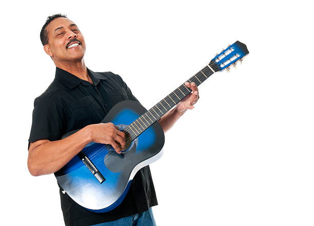 African American Man Enjoying the Guitar Isolated on WhitePLEASE EMAIL ME to let me know how you used my photograph. I would appreciate it very much! Thank you for taking the time.