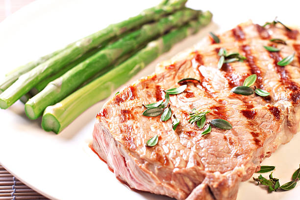 istock Steak with asparagus and potateos 184147030
