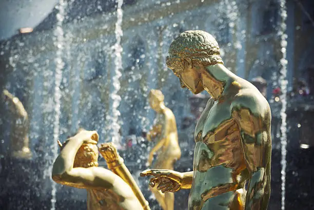 Golden statues in Peterhof. St. Petersburg.