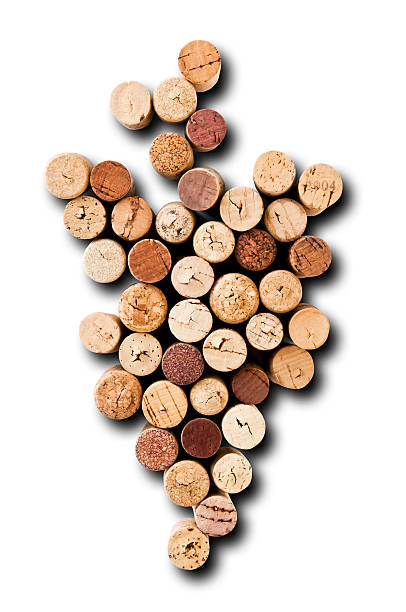 istock Bunch of wine corks grapes isolated on white 184147673