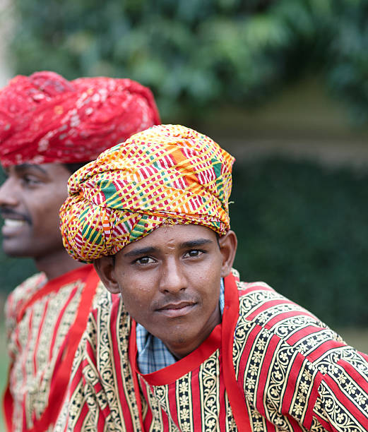 istock Indian drummer boy in traditional costume 184147927