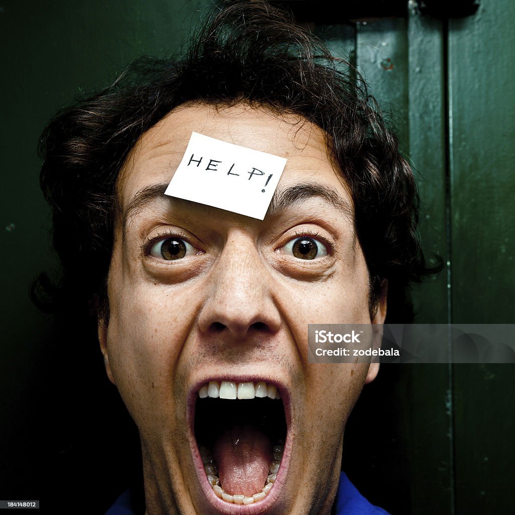 Man Screaming Help Young screaming for help One Person Stock Photo