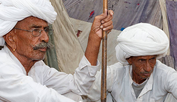 istock Tribal men in white Pushkar Rajasthan India 184148154