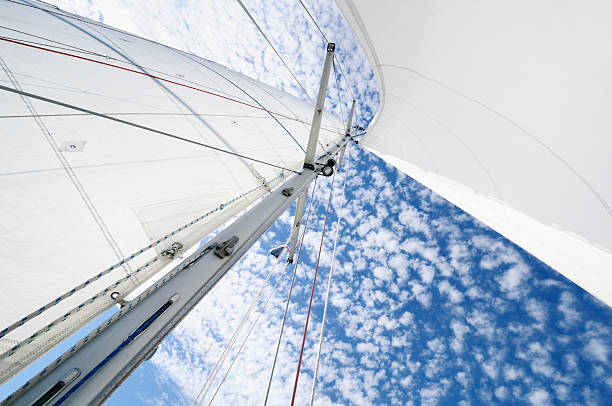 White sails and altucumulus cloud stock photo