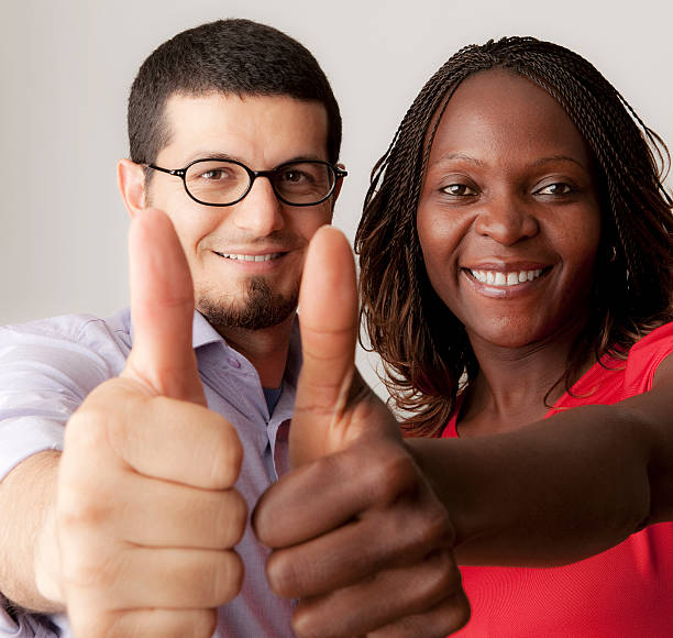 istock Young couple showing ok sign 184148262