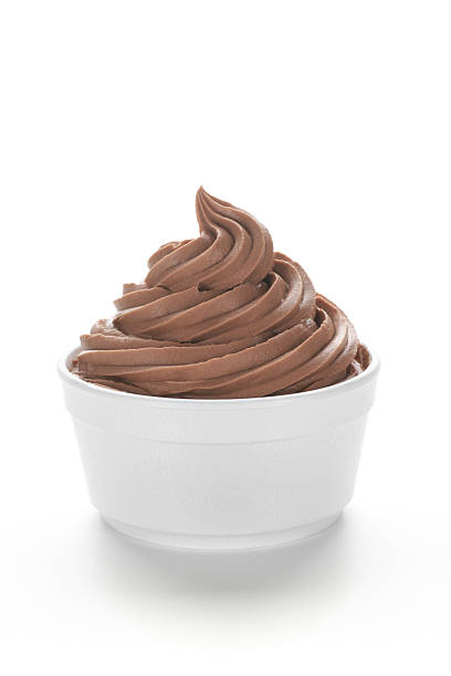 Chocolate Frozen Yogurt Single serving of chocolate frozen yogurt (or soft serve ice cream) in a standard disposable restaurant portion cup. frozen yoghurt stock pictures, royalty-free photos & images