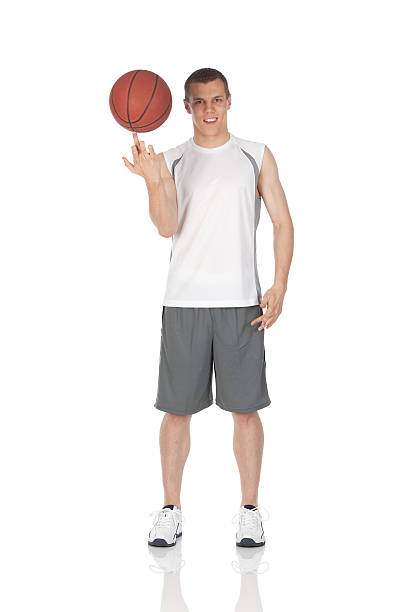 istock Man balancing basketball on finger 184148854