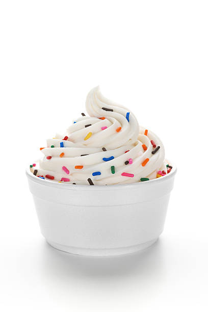 Frozen Yogurt with Sprinkles Single serving of frozen yogurt (or soft serve ice cream) with sprinkles in a standard disposable restaurant portion cup. frozen yoghurt stock pictures, royalty-free photos & images