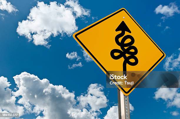 Yellow Sign With Confusing Directions Stock Photo - Download Image Now - Advice, Alertness, Choice