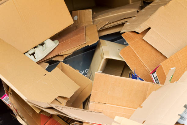 istock A pile of cardboard pieces in a recycle bin 184151112
