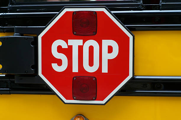 istock Red Stop Sign Attached to a School Bus 184151199