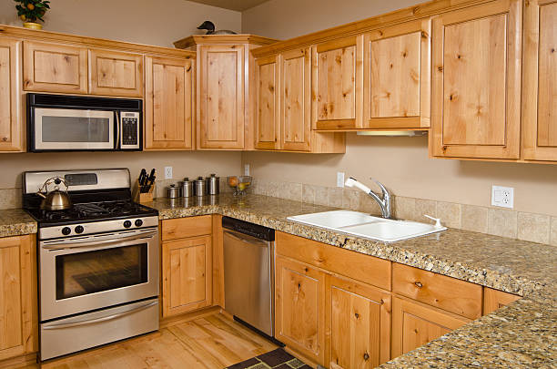 istock Modern kitchen with hardwood cabinets and floor 184151303