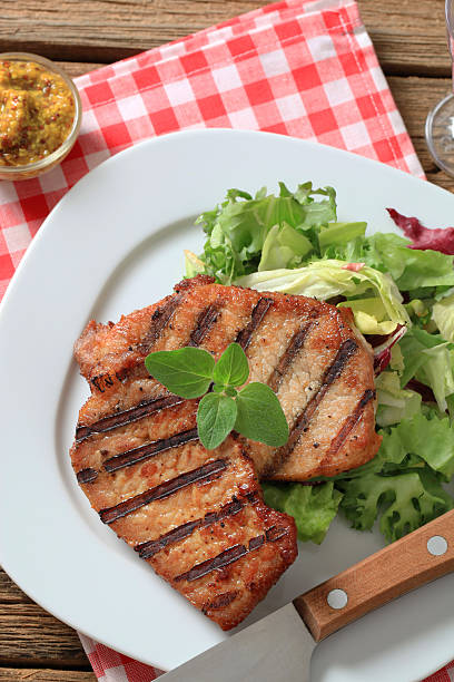 istock Grilled pork and salad 184151535