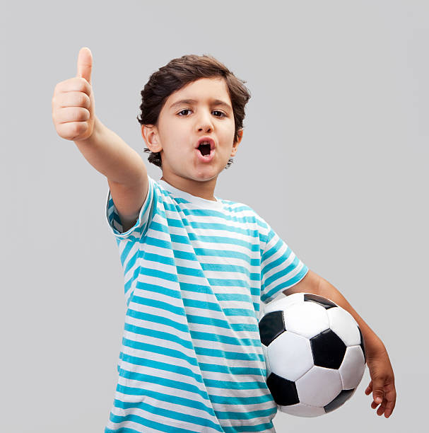 istock Young football player 184151615