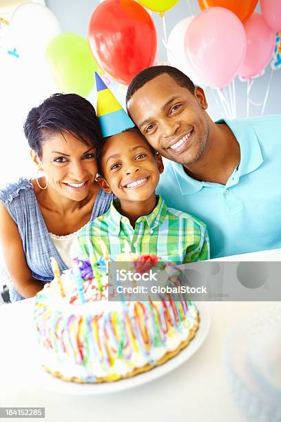 Happy Family With A Birthday Cake Stock Photo - Download Image Now - 30-39 Years, Adult, African Ethnicity