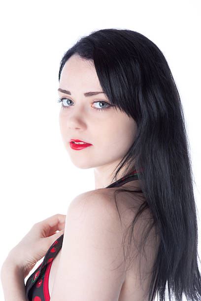 istock Raven Haired Young Adult Looking Over Her Shoulder 184152300