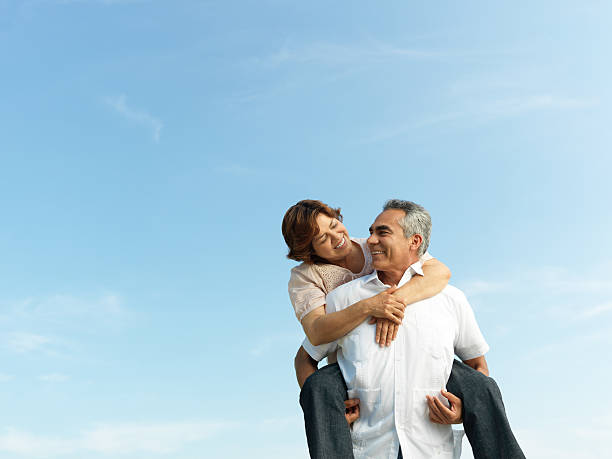 istock Playful mature couple 184152573