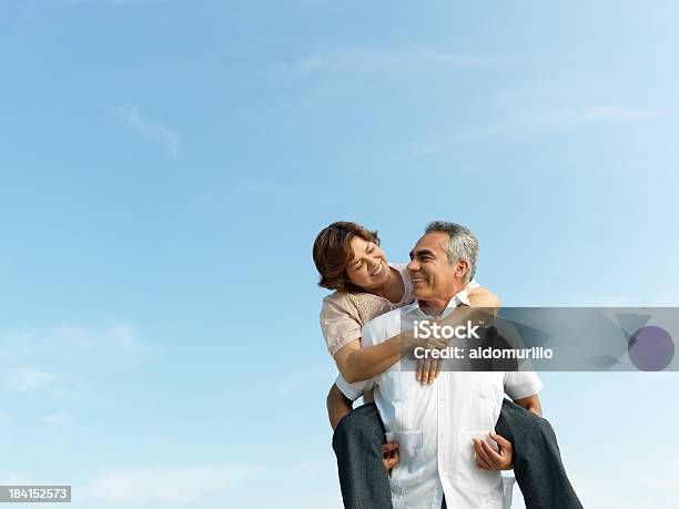 Playful Mature Couple Stock Photo - Download Image Now - 50-59 Years, Couple - Relationship, Vitality