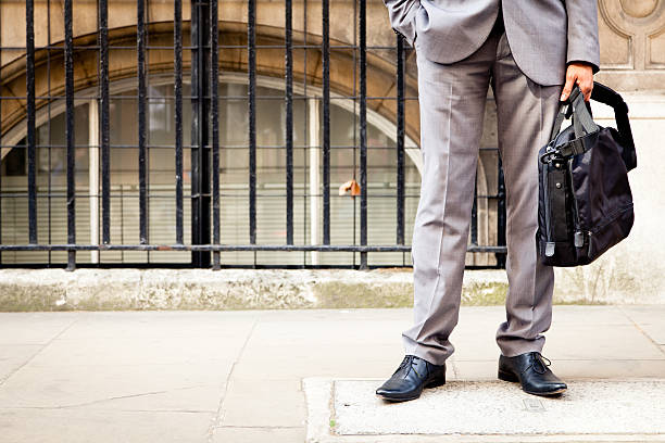 istock Businessman holding a suitcase 184152830
