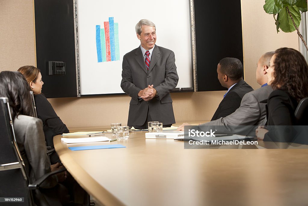 Business Presentation Businessman giving a presentation.View More. 30-34 Years Stock Photo