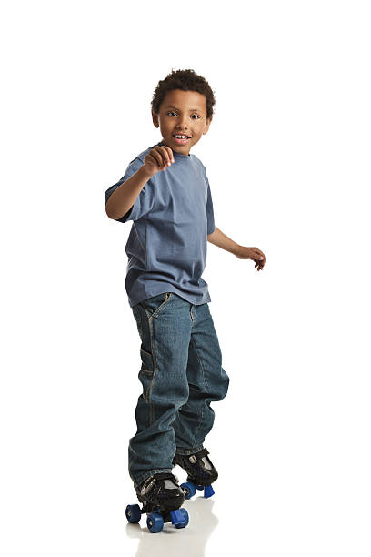 Boy on Roller Skates stock photo
