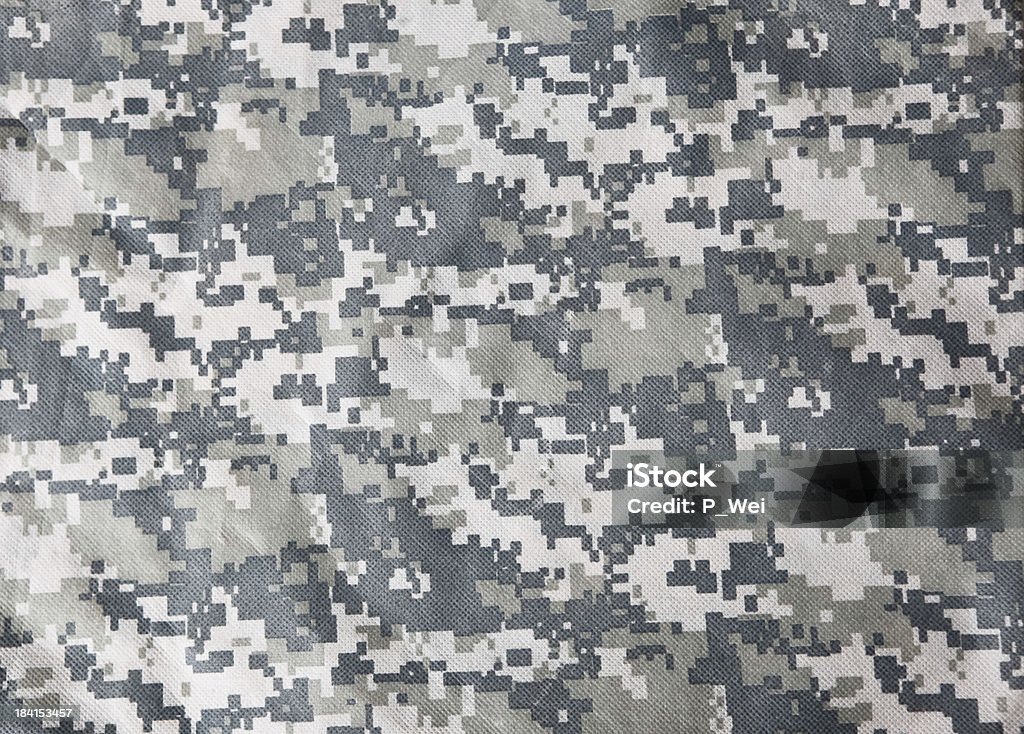 Avançada contra fundo uniforme de camuflagem (ACU - Foto de stock de Roupa de Camuflagem royalty-free