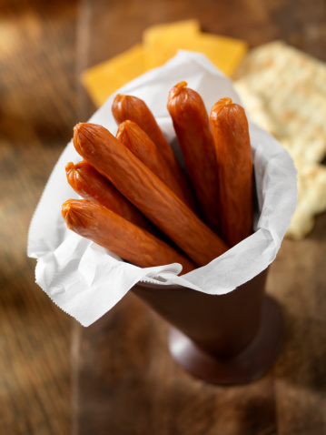 Pepperoni Sticks with Cheese and Crackers -Photographed on Hasselblad H3D2-39mb Camera