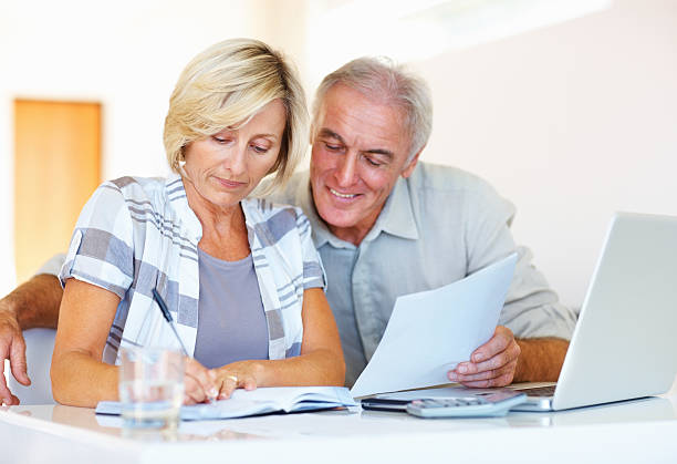 istock Senior couple budgeting 184154069