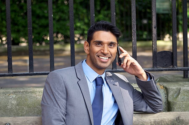 istock Young Business Man with Smart Phone 184154372