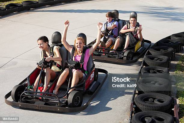 Adolescentes Riding Gocestas Foto de stock y más banco de imágenes de Kart - Kart, Karting, Adolescente