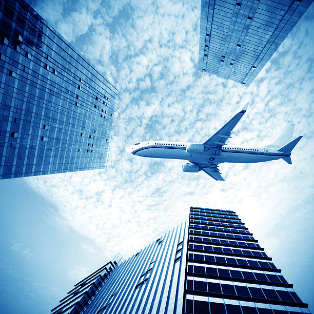 istock Airplane over the city 184155219