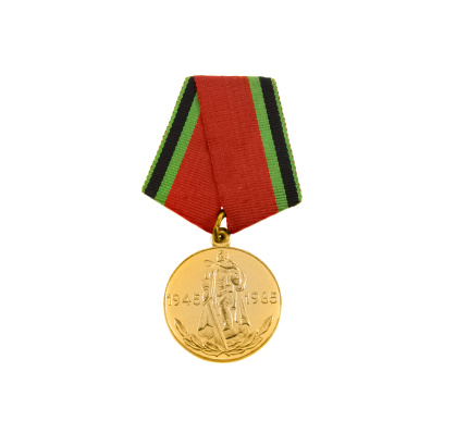 Gold medal with ribbon on coffee beans