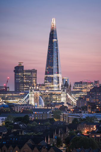 this is the shard and the tower bridge in london