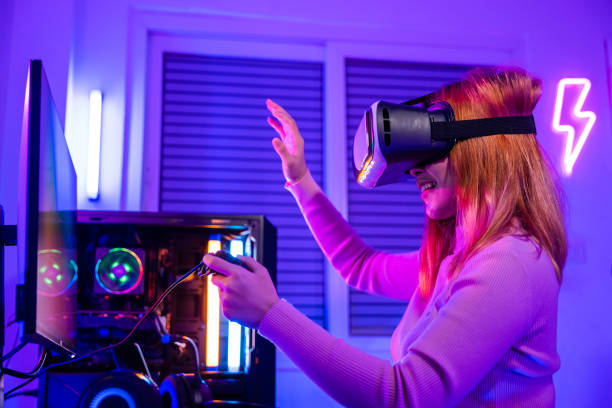 istock Excited woman playing watching video life simulation at home 1841597321