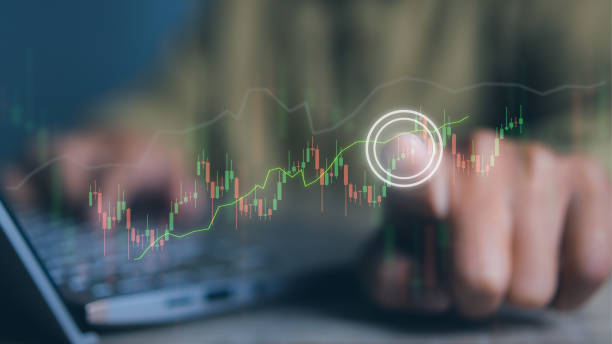 istock Businessman using laptop with forex trading graph financial data. Goal business success strategy chart target and planning. Stock market, financial graph growth report, business development. 1841610285