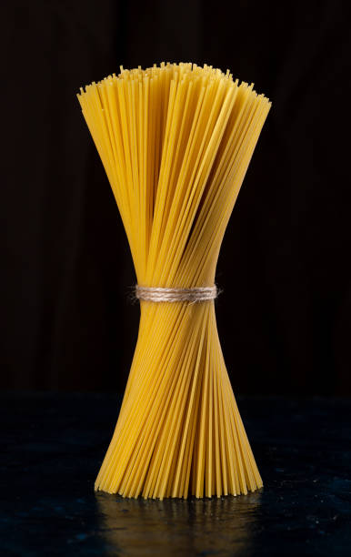 istock A bunch of raw yellow spaghetti 1841657289
