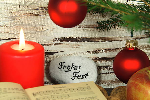 istock old hymnal, Christmas decoration and candle 184170853